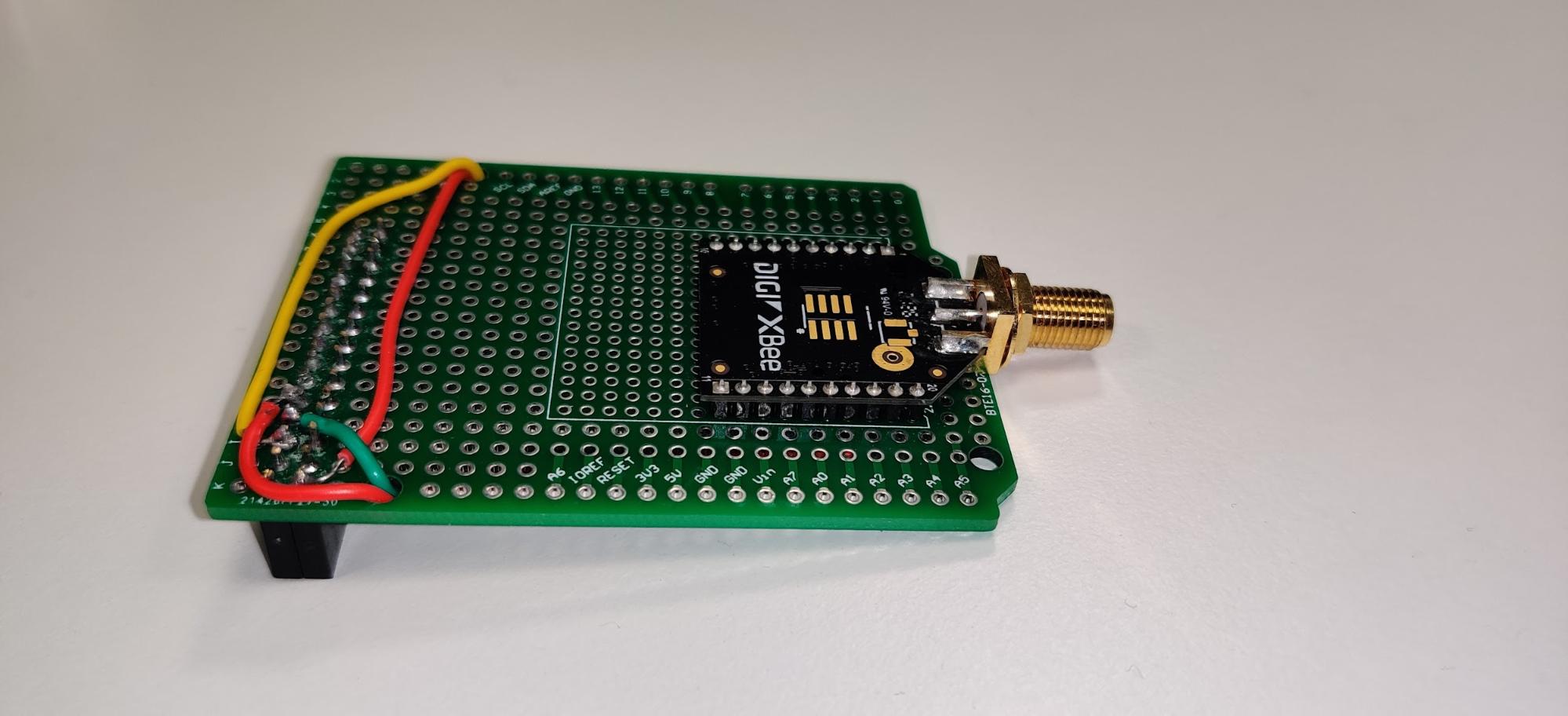 Raspberry Pi equipped with Raspbian, Greengrass, and a simple shield